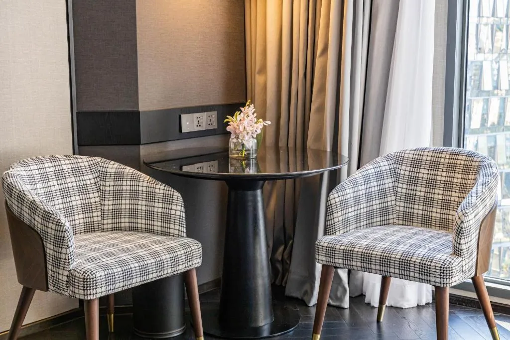 Seating area in a room at InterContinental Bangkok Sukhumvit, IHG in Bangkok