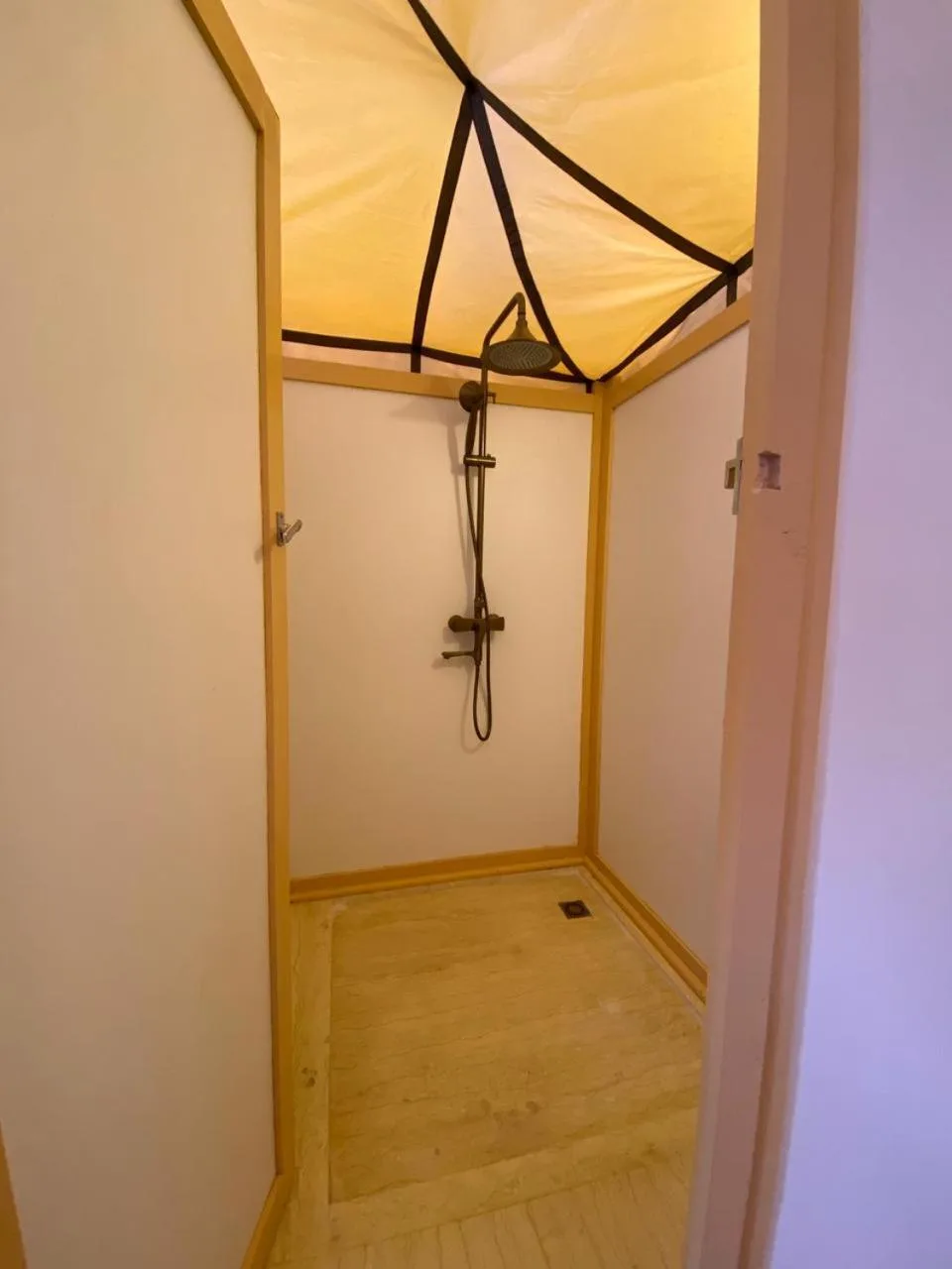 Shower area in a tent at ITRAN ROYAL CAMP.
