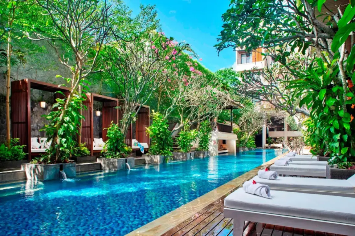 Poolside cabana area at Jambuluwuk Oceano Seminyak Hotel in Seminyak, Bali