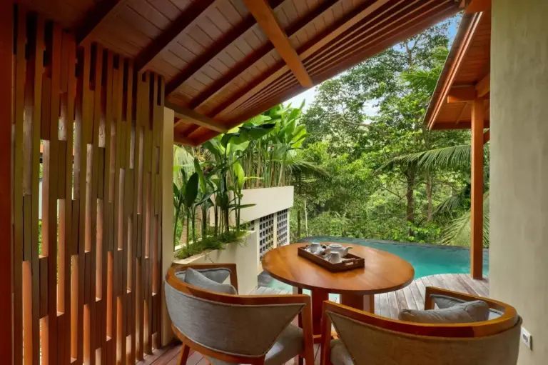 Seating area with pool view at Jannata Resort and Spa
