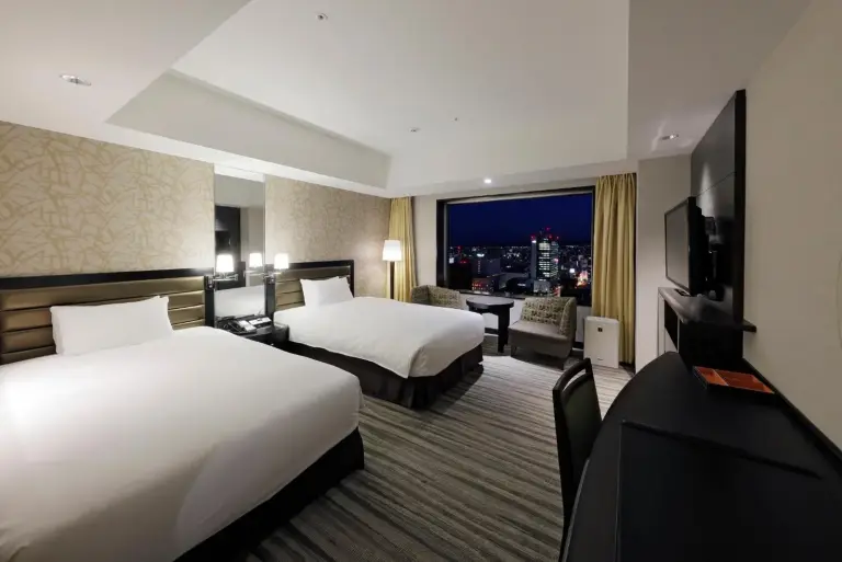 JR Tower Hotel Nikko Sapporo double guest room at night