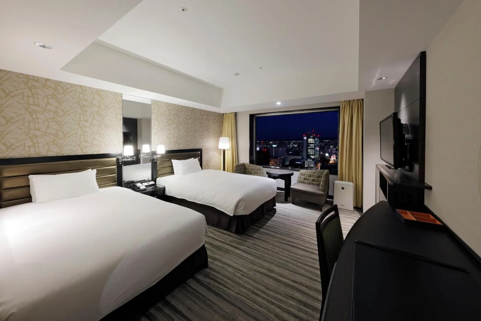 JR Tower Hotel Nikko Sapporo double guest room at night