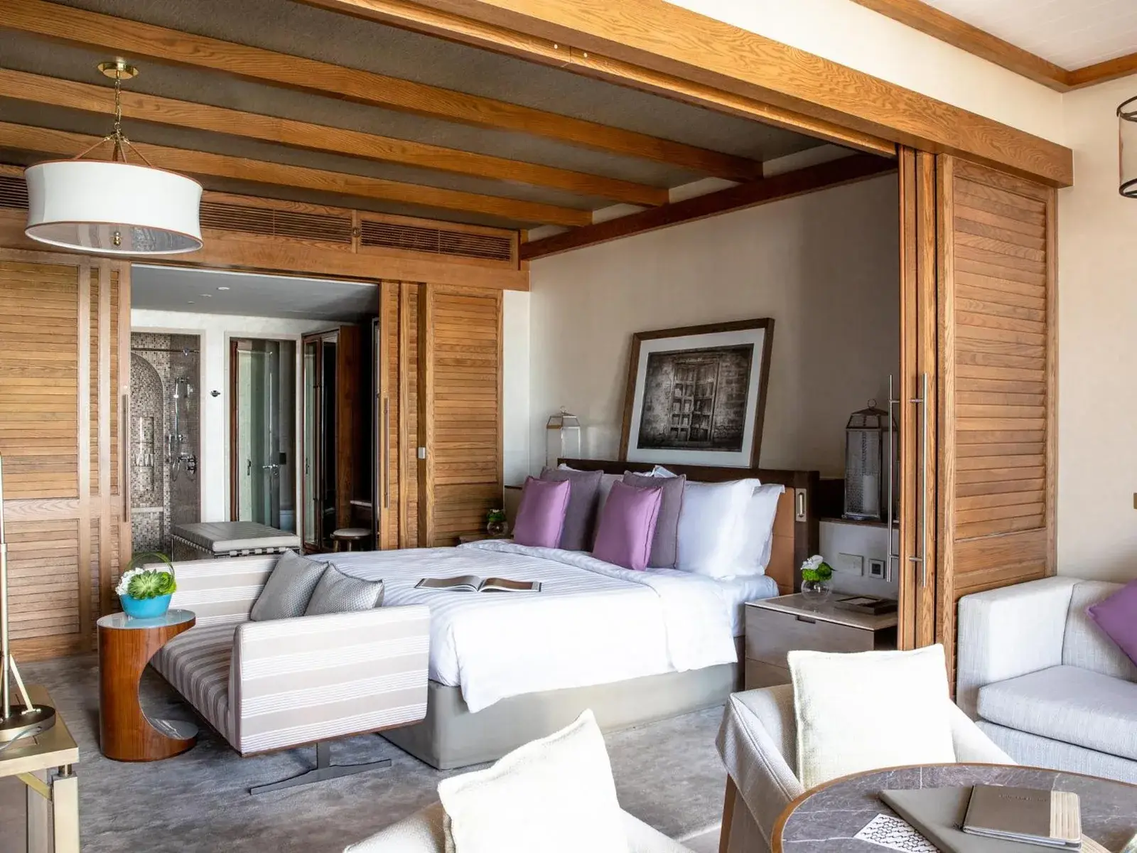 Jumeirah Al Naseem Dubai – Dubai, United Arab Emirates hotel – a bedroom with a large bed and a couch at Jumeirah Al Naseem Dubai in Dubai