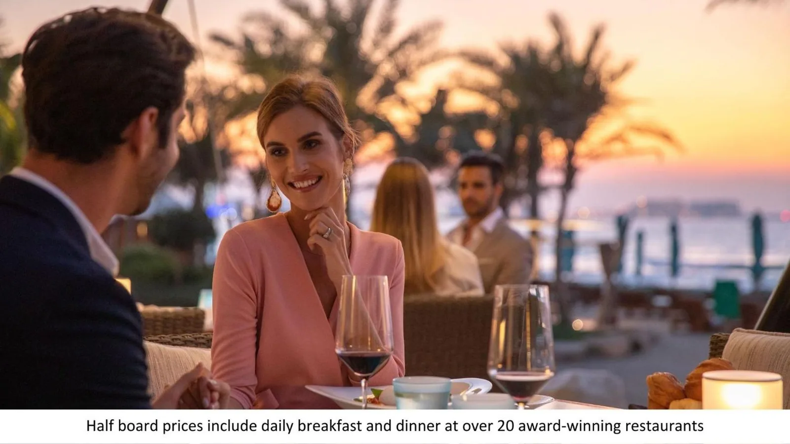 Jumeirah Al Naseem Dubai – Dubai, United Arab Emirates hotel – a group of people sitting at a table with wine glasses at Jumeirah Al Naseem Dubai in Dubai