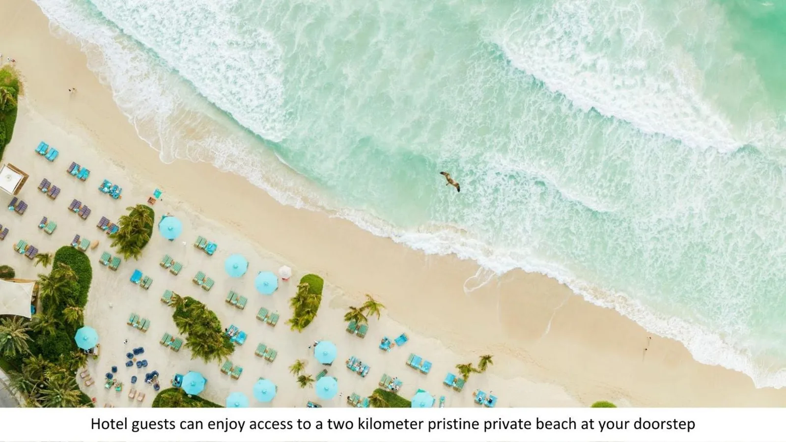 Jumeirah Al Naseem Dubai – Dubai, United Arab Emirates hotel – an aerial view of a beach with chairs and umbrellas at Jumeirah Al Naseem Dubai in Dubai