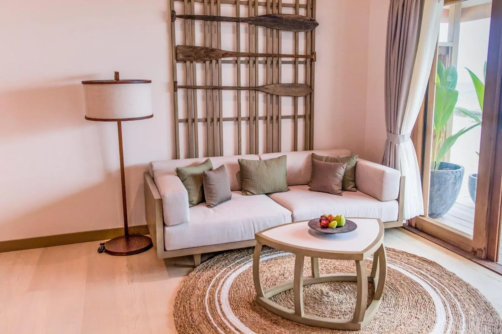 Living area in a suite at Kagi Maldives Resort & Spa