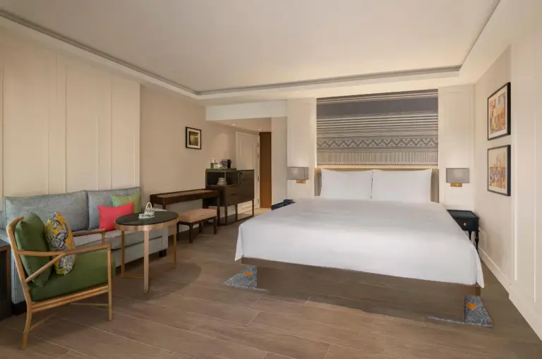 Interior view of a Deluxe room at Kahavadi Chiang Rai, Curio Collection by Hilton