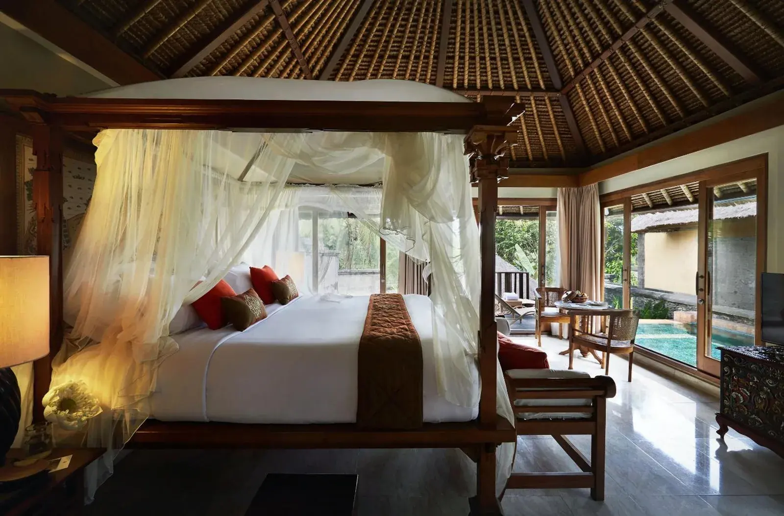 Kamandalu Ubud – Ubud, Indonesia hotel – a bathroom with a sink and a tub and a mirror at Kamandalu Ubud in Ubud
