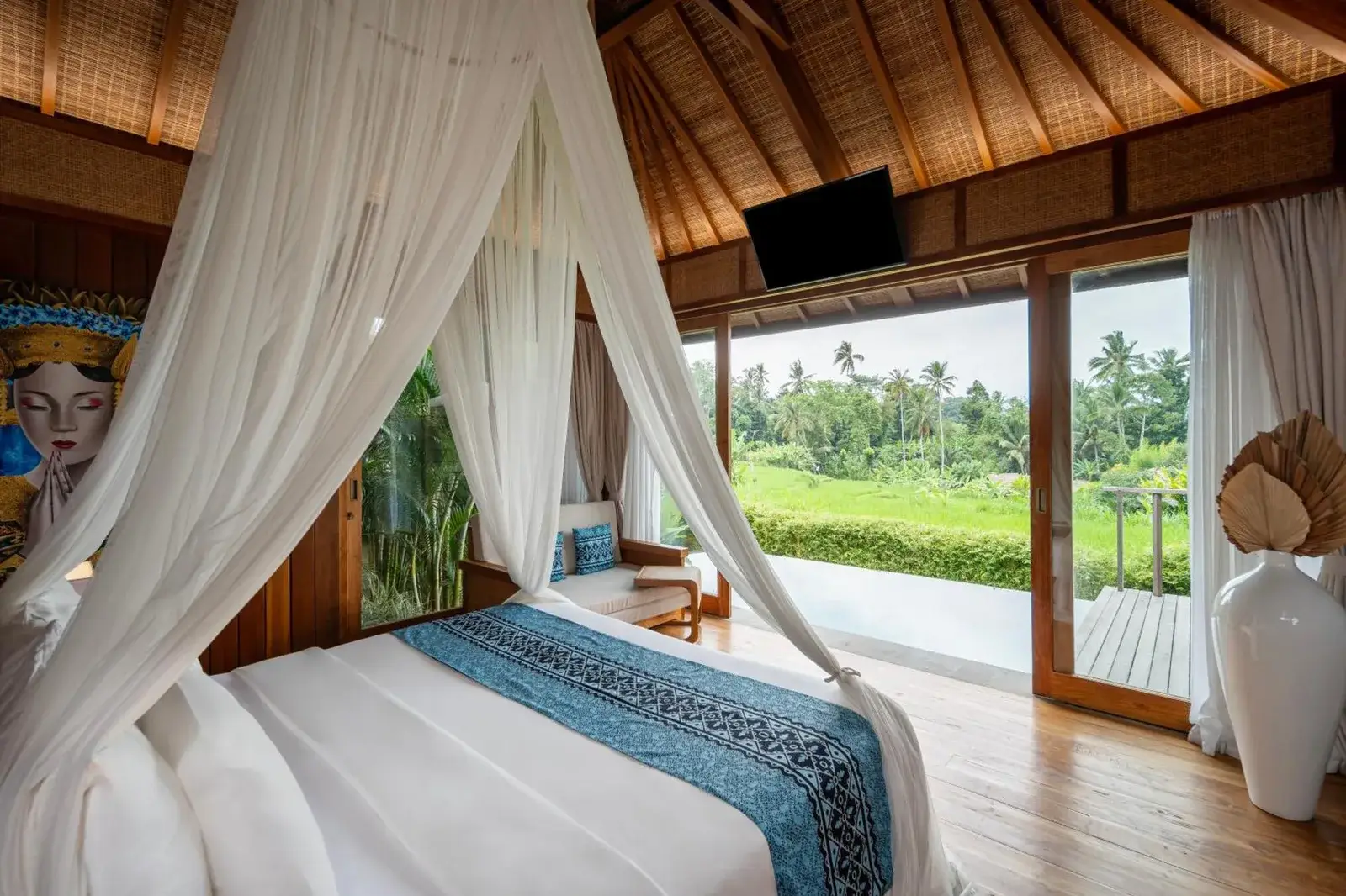 Elegant bedroom with lush views at Kappa Senses Ubud