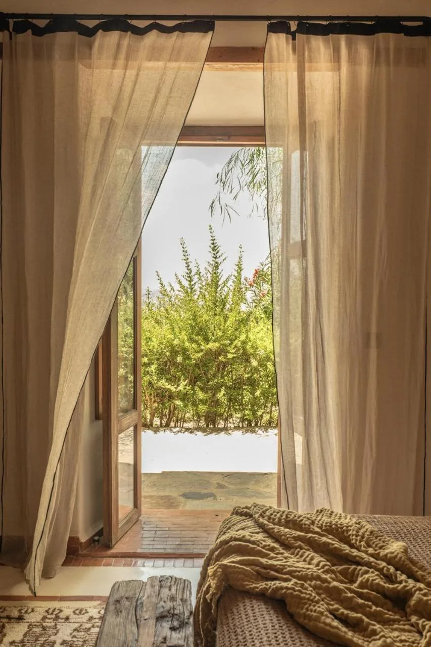 Cozy room view at Kasbah d'if in Marrakech, leading to an outdoor garden