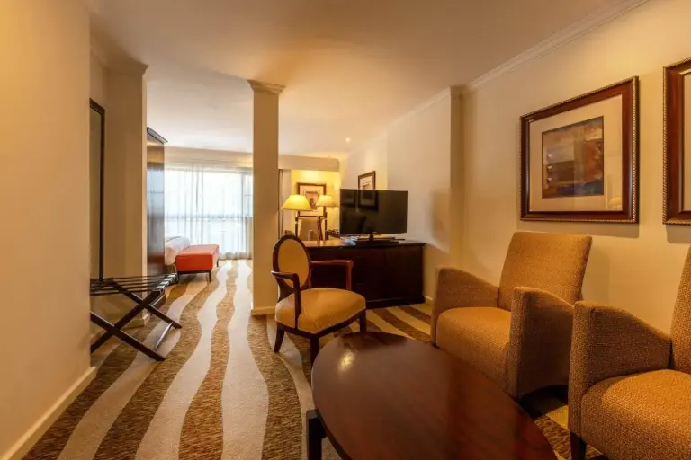 Seating area in a suite at Kigali Serena Hotel