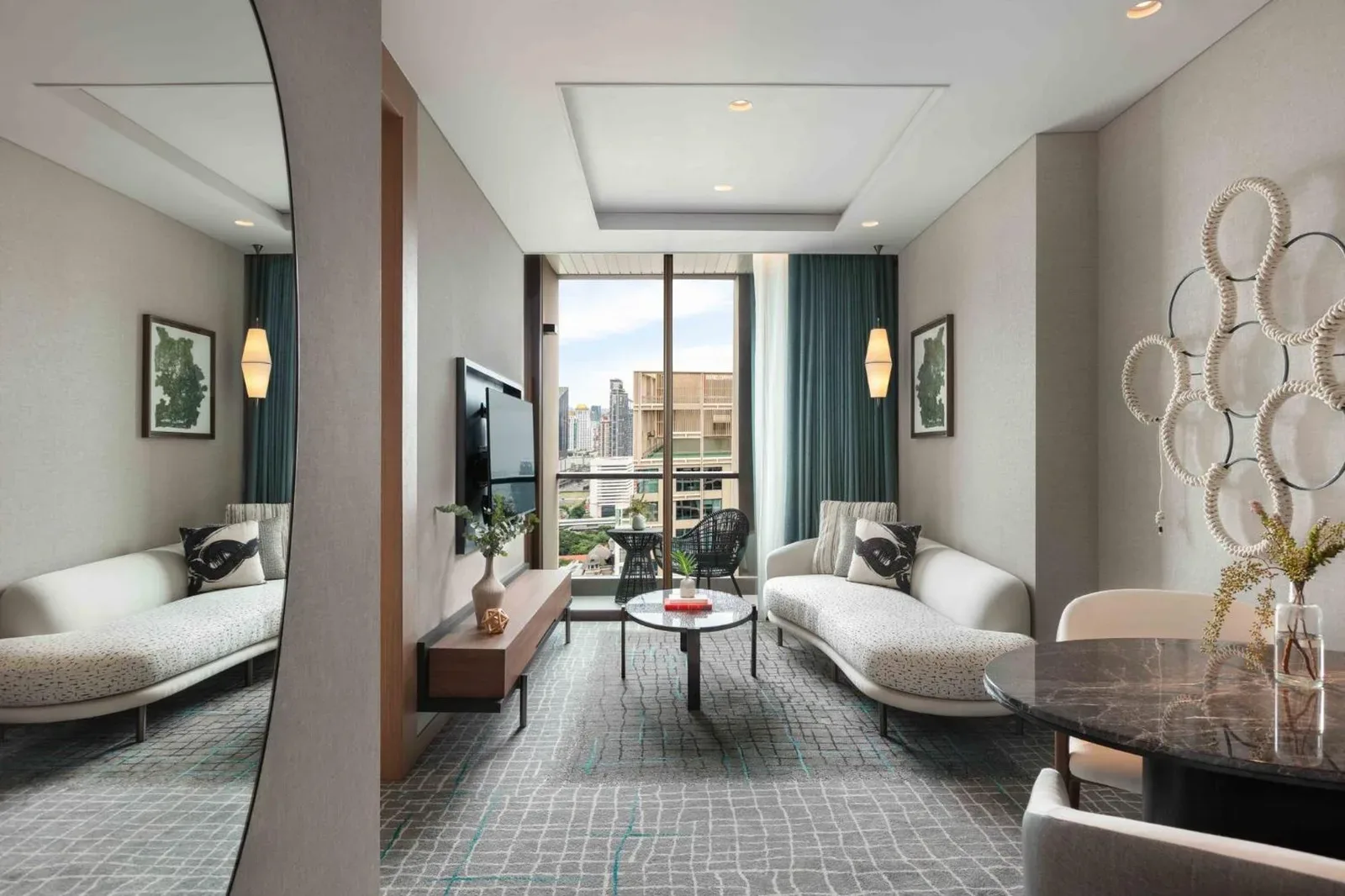 Inviting living area at Kimpton Maa-Lai Bangkok by IHG