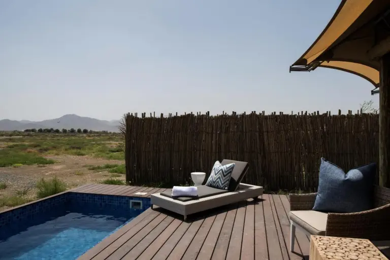 Kingfisher Retreat by Sharjah Collection poolside