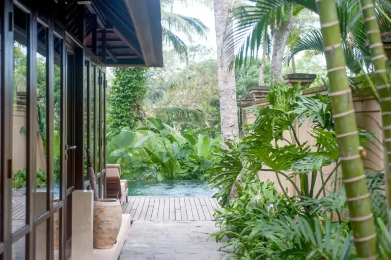 Garden pathway leading to a private area at Komaneka at Tanggayuda Ubud