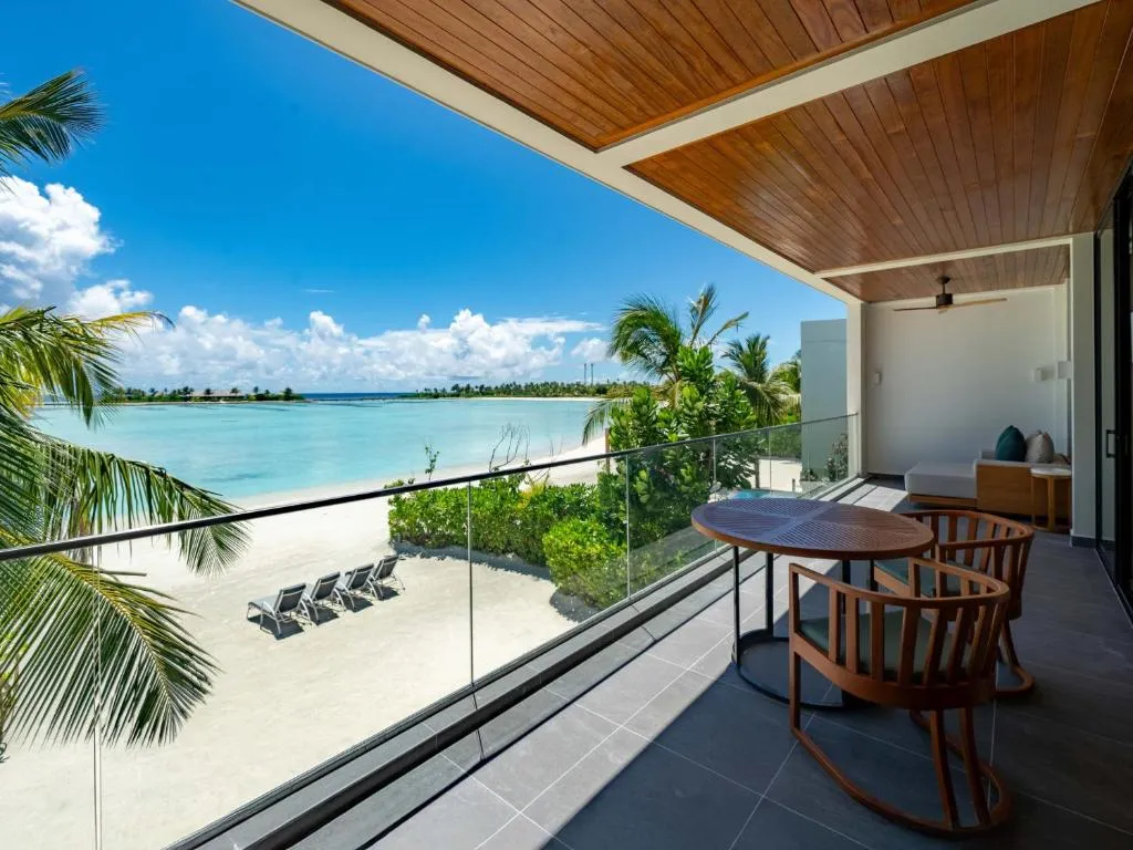 Stunning beachfront view from a balcony at Kuda Villingili Maldives