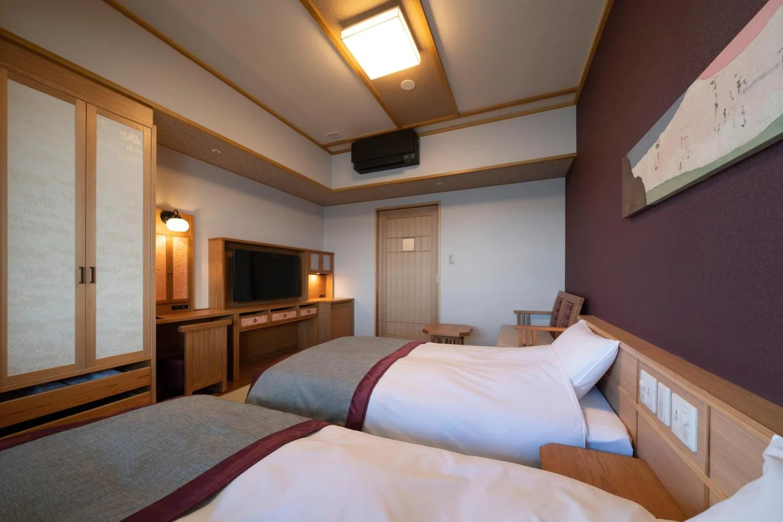 Innenansicht eines Deluxe Twin Room im Kyoto Umekoji Kadensho