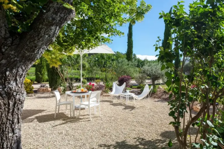 Dining setup in the garden at La Bastide de Damien