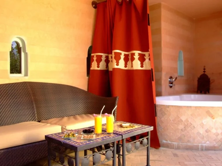 Outdoor seating area at La Maison Arabe Hotel