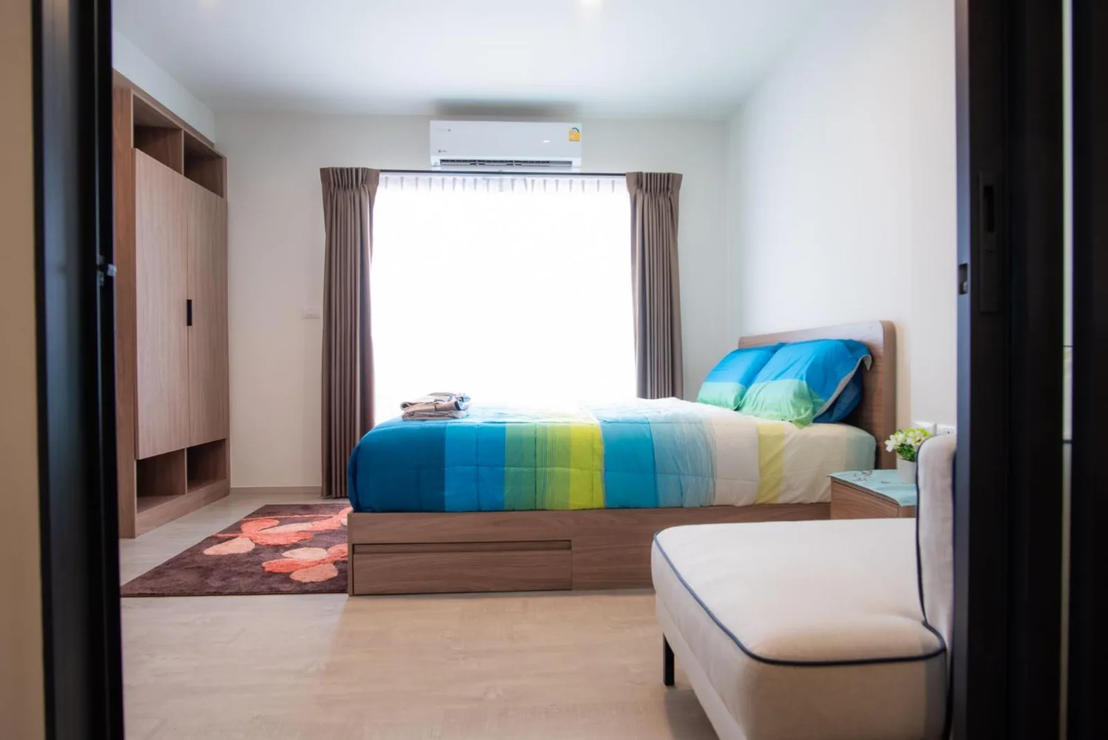 Bedroom interior at Lacasita484 In Huahin in Hua Hin with sofa and bed