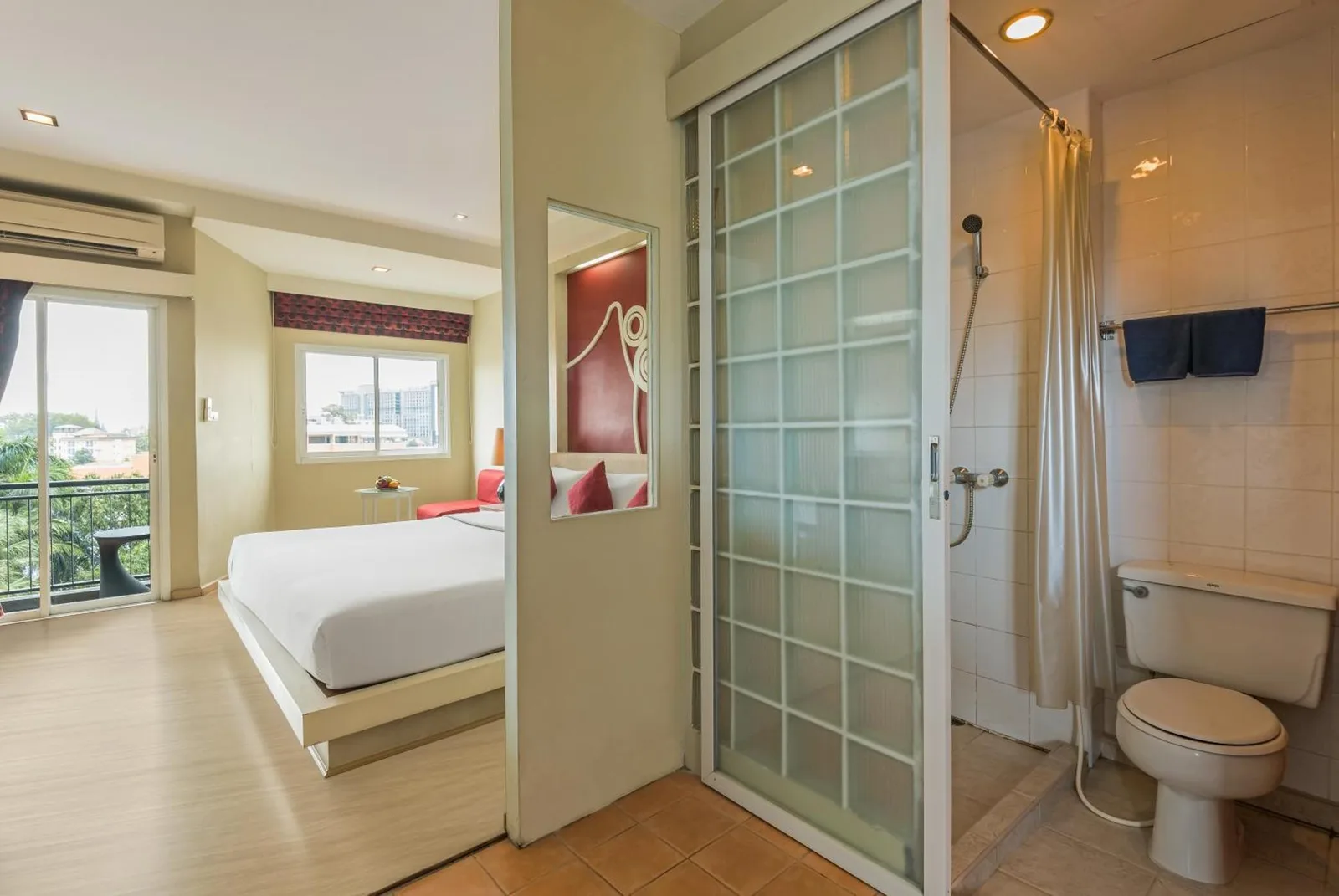 Accessible bathroom and bedroom at Lantana Pattaya - SHA Extra Plus in Pattaya with sliding door shower area