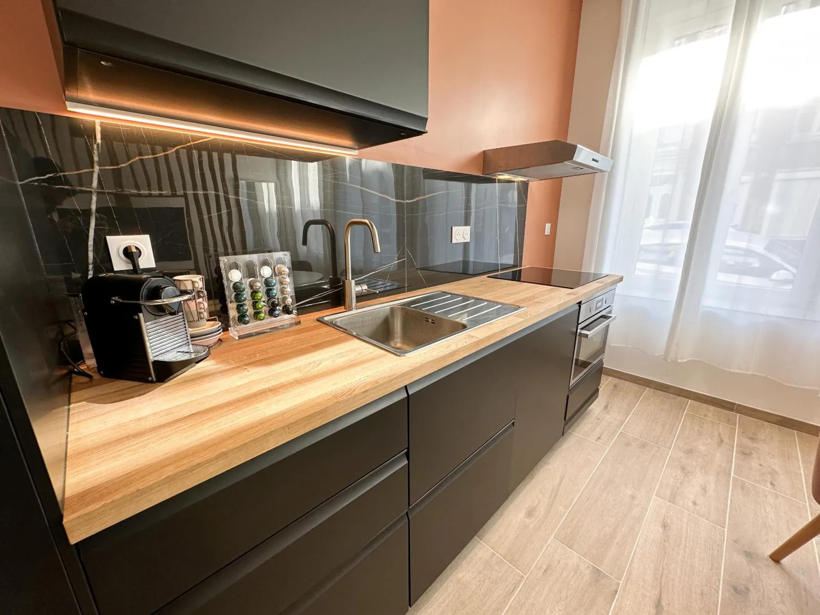 Fully equipped kitchen at Le Bijou Hotel in Lille