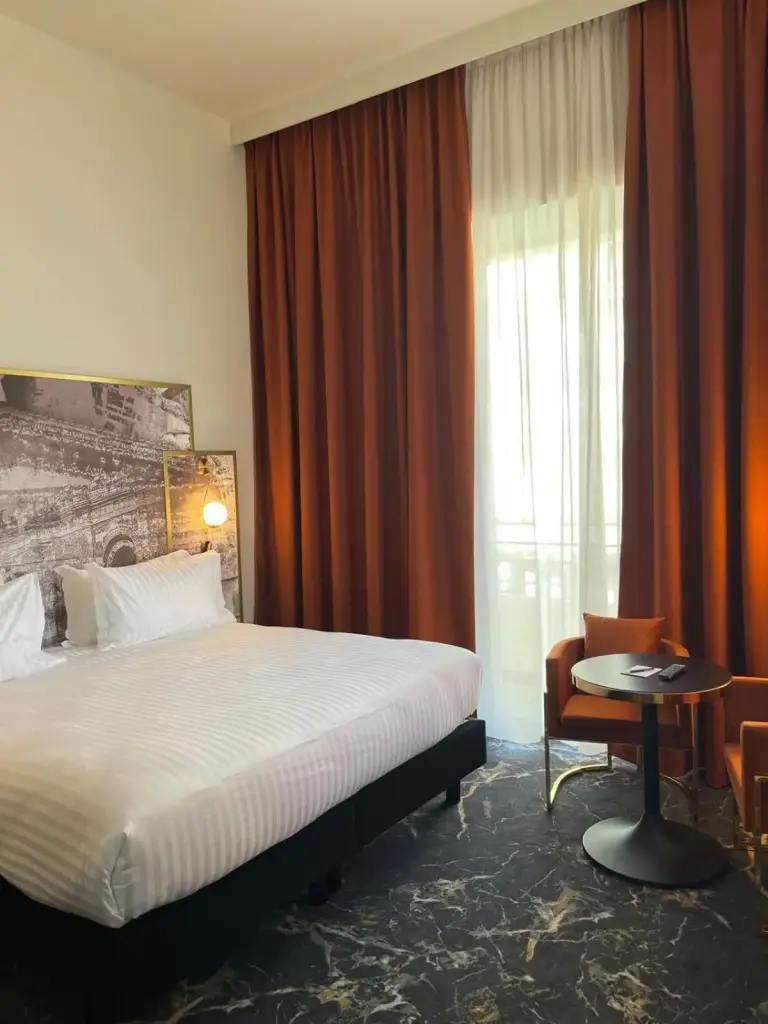 Elegant bedroom at Le Grand Hôtel Dieu by SOWELL COLLECTION in Nimes