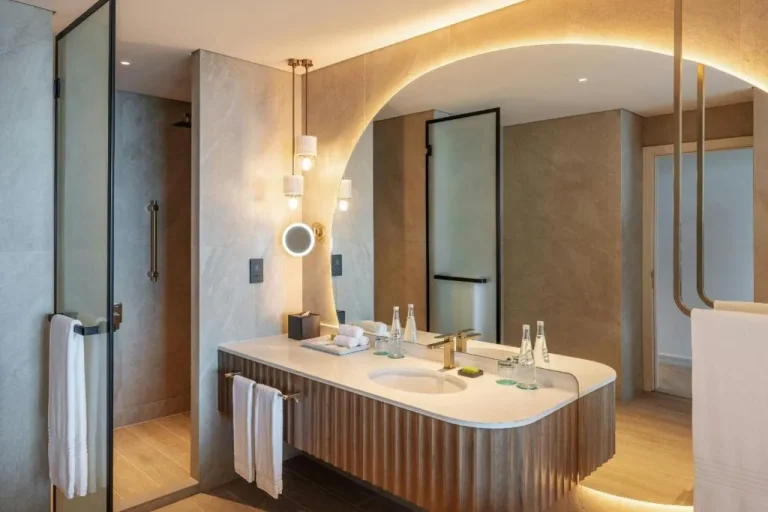 Modern bathroom setup at Le Meridien Al Aqah Beach Resort