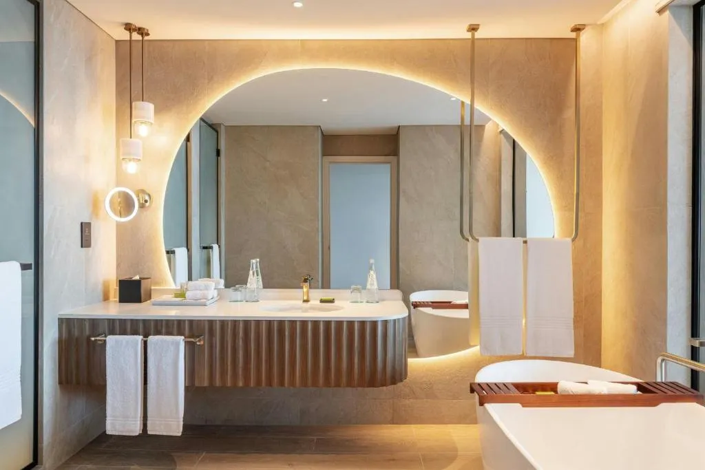 Stylish bathroom sink area at Le Meridien Al Aqah Beach Resort