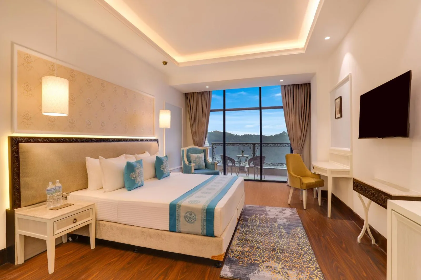Deluxe king room at Lemon Tree Premier Budhanilkantha Kathmandu, Nepal with balcony views and modern decor