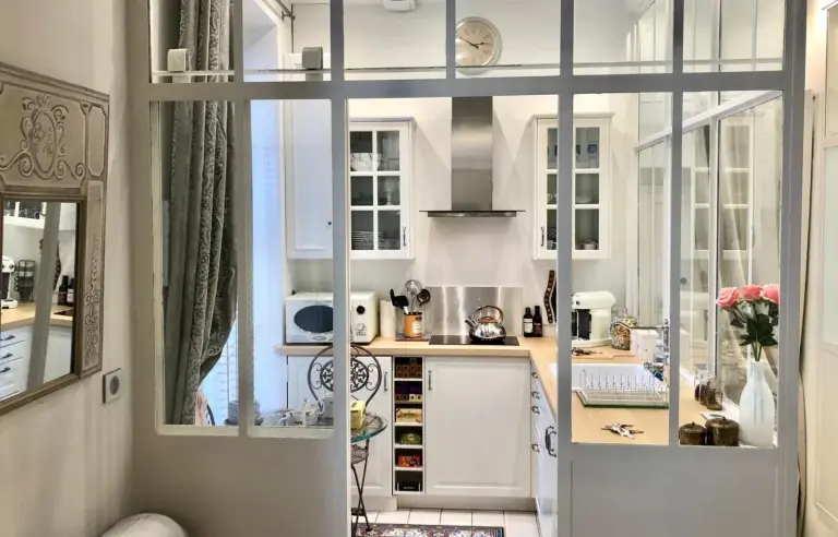 Les Anges Deluxe bright kitchen area with ample storage