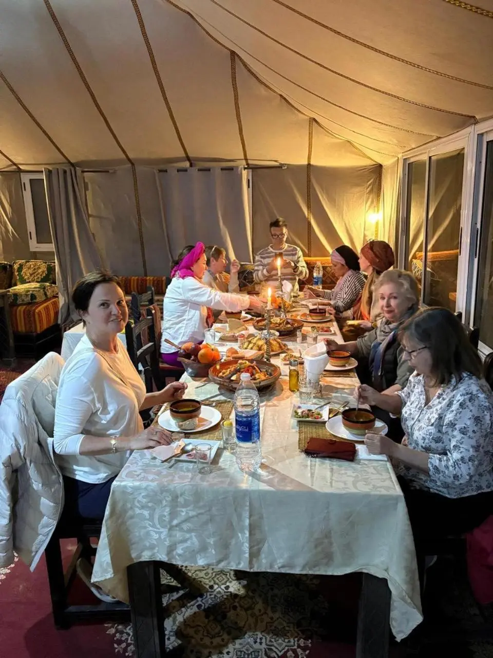 Dining table setup at Les Pyramides Luxury Desert Camp in Merzouga