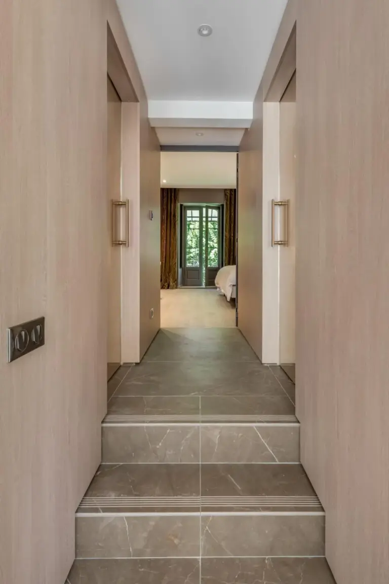 Modern hallway in Les Suites de l'Ile Barbe hotel, Lyon