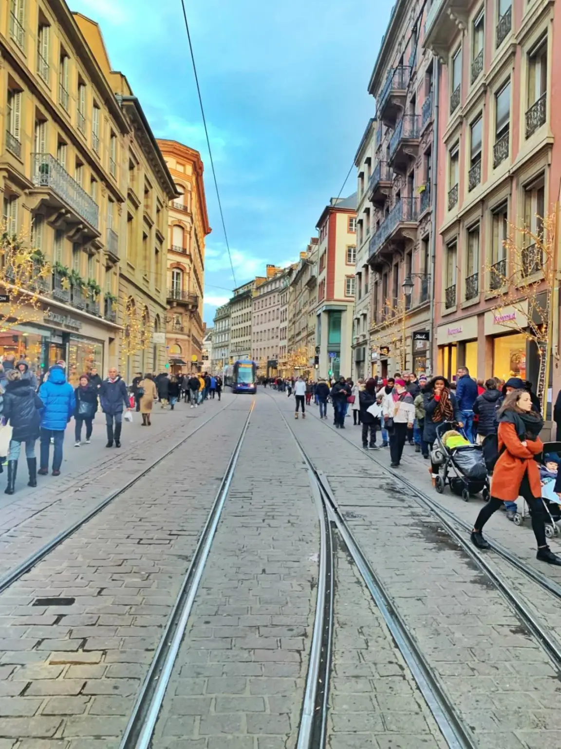 Busy shopping street near Life VOYAGE & Spa in Strasbourg