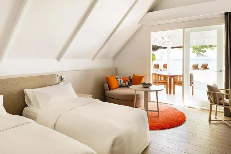 Configuration de chambre double au LUX* South Ari Atoll Resort & Villas