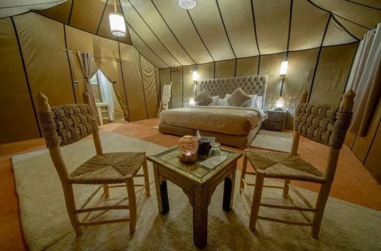 Seating area in a tent at Luxury Merzouga Camp in Merzouga