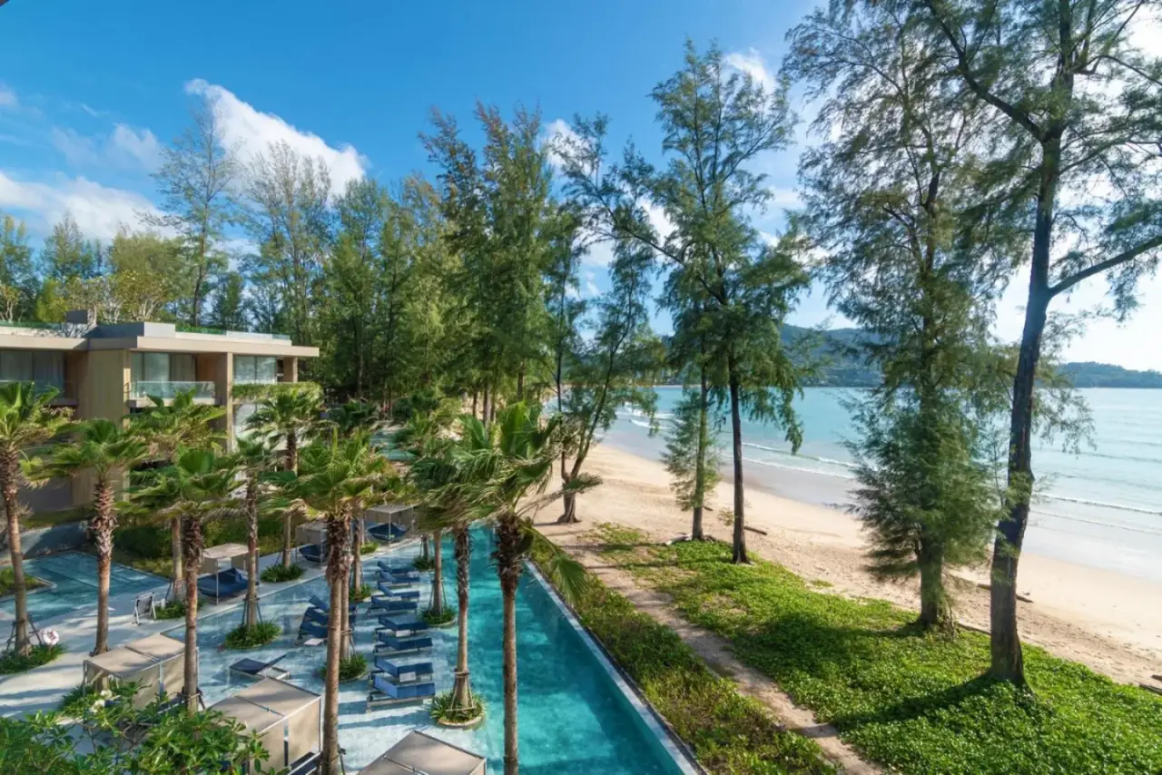Luxury Penthouse beachfront view in Phuket with palm trees