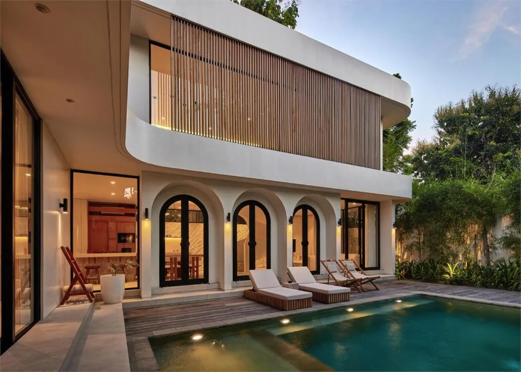 Lyvin Bingin Villas poolside view with lounge chairs