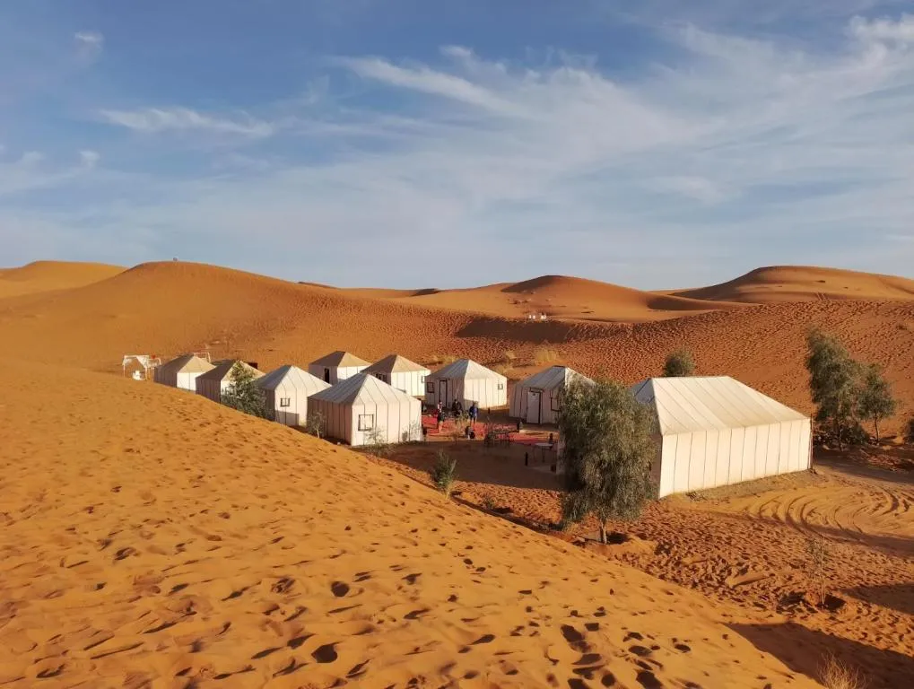 Magic Luxury Camp in Merzouga showcasing desert tents