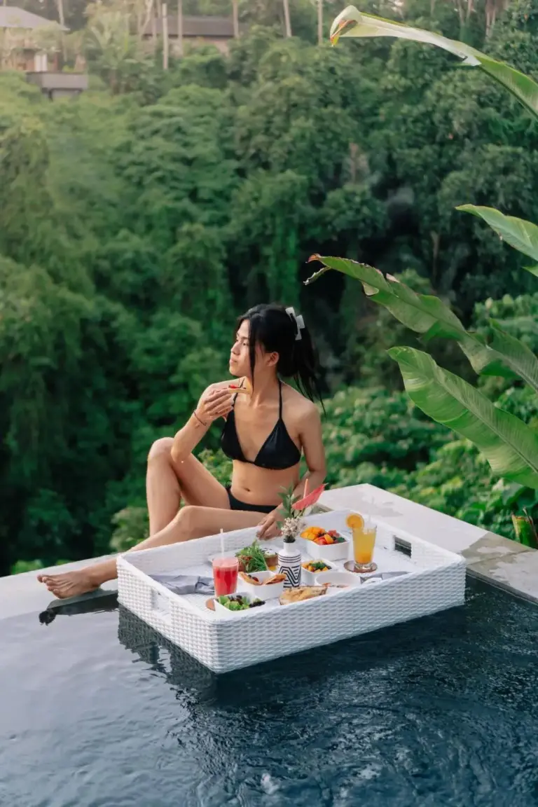 Magical Jungle Resort woman enjoying snacks by pool