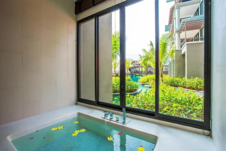 Relaxing view from the tub in a guestroom at Mai Holiday by Mai Khaolak