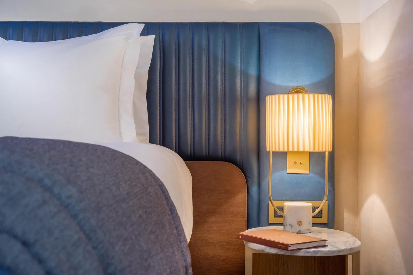 Elegant nightstand in guestroom at Maison Albar Hotels L’Imperator in Nimes