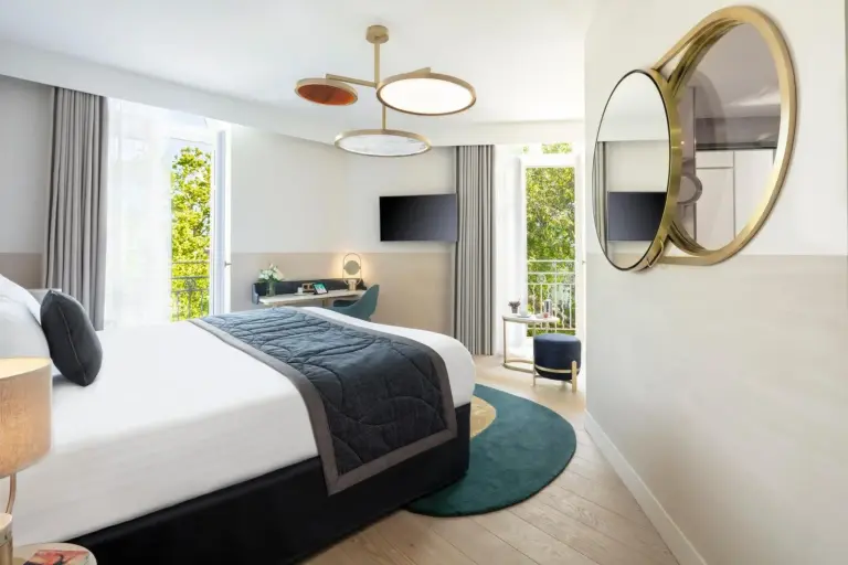 Spacious bedroom at Maison Albar Hotels L’Imperator in Nimes