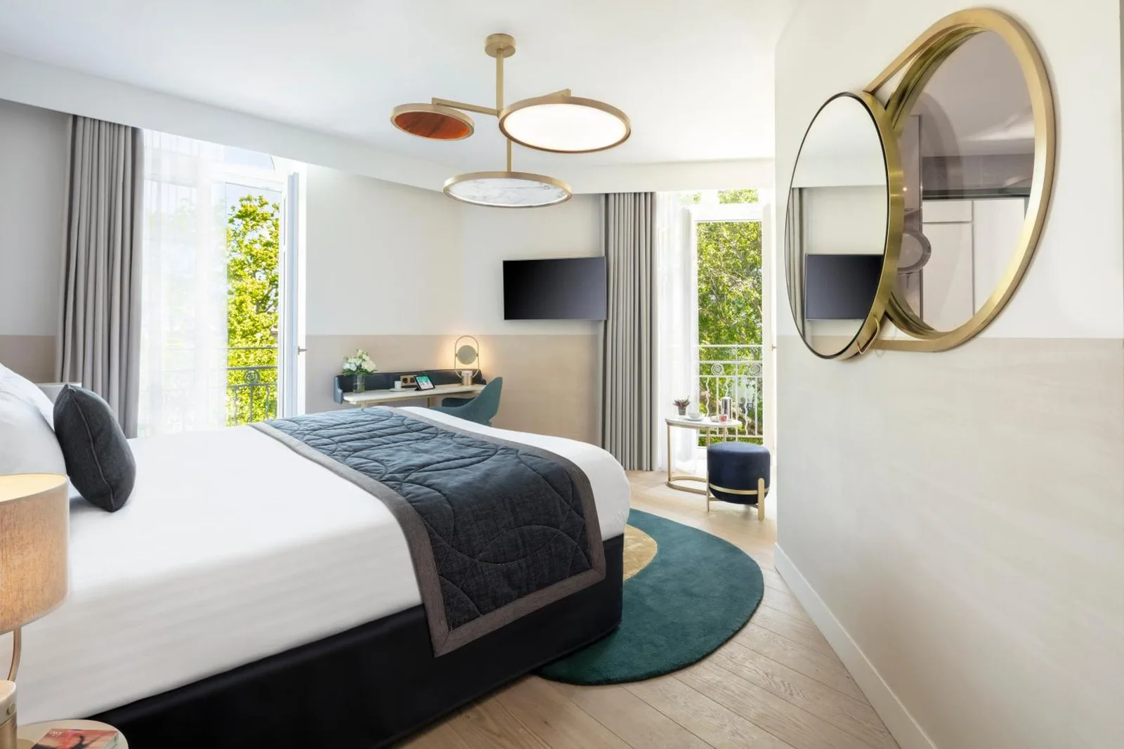 Spacious bedroom at Maison Albar Hotels L’Imperator in Nimes