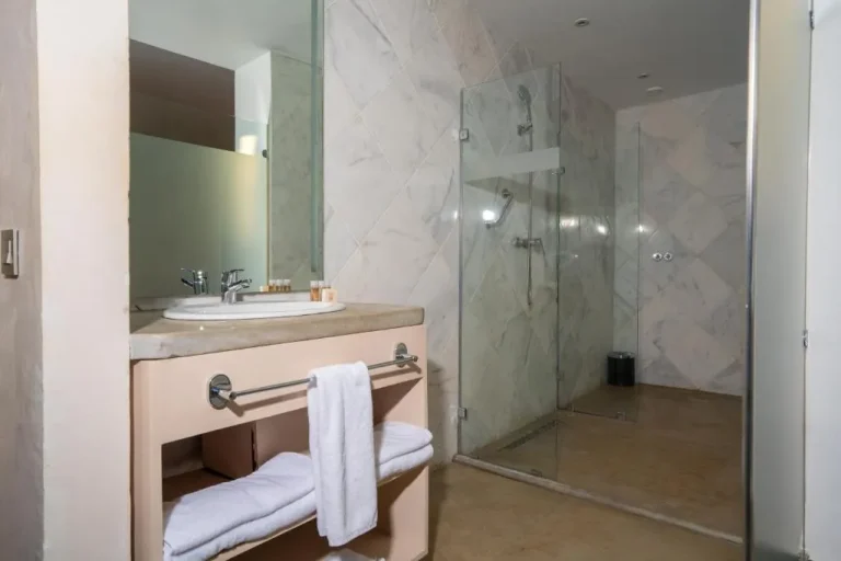 Stylish glass shower in bathroom at Mandarin Hotel & Spa Tanger