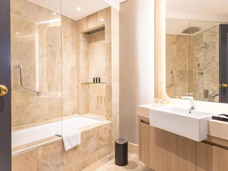 Elegant bathroom at Mangkuluhur ARTOTEL SUITES in Jakarta