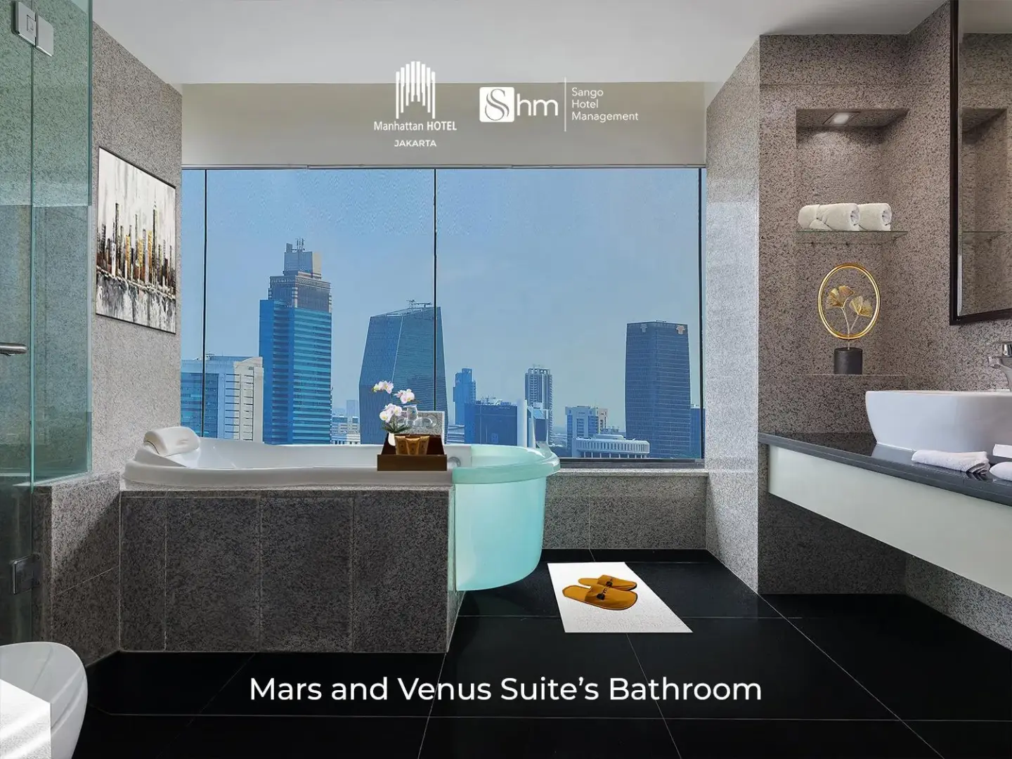 Baño de la Mars and Venus Suite en Manhattan Hotel Jakarta