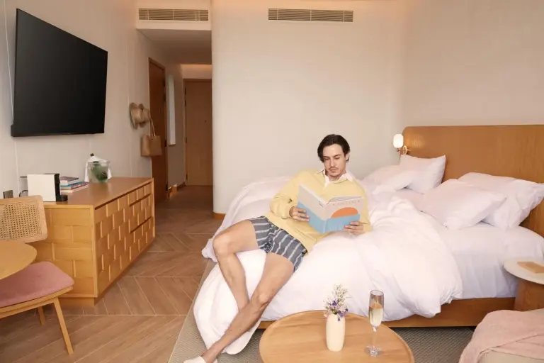 Marasca Samui - Small Luxury Hotels of the World guest reading in room