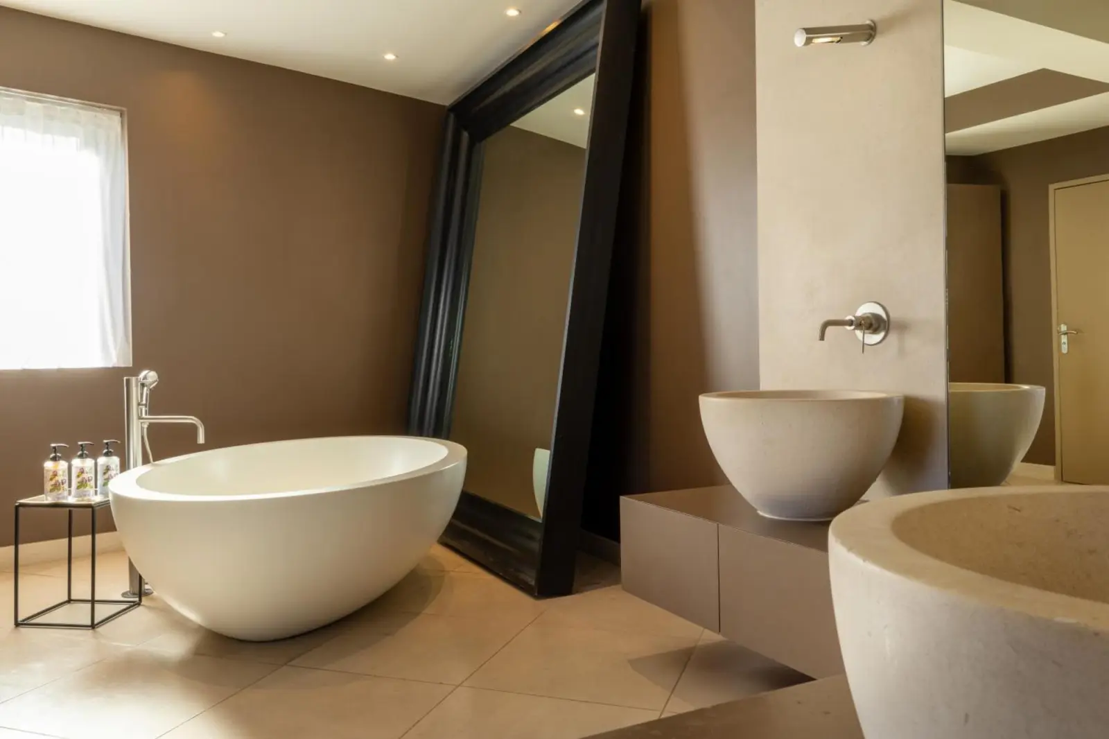 Elegantes Badezimmer im Hôtel Chouleur in Nîmes