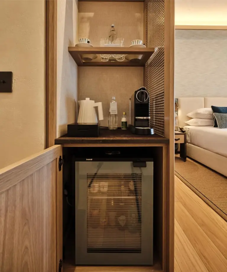 In-room fridge and coffee station at Mazzarò Sea Palace