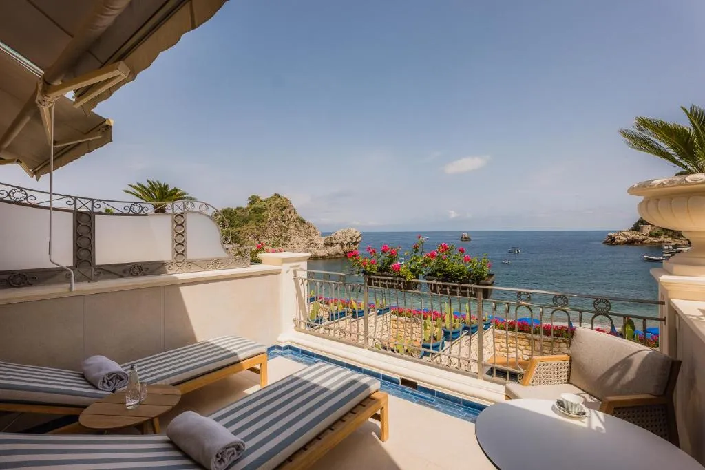 Private terrace with sun loungers at Mazzarò Sea Palace
